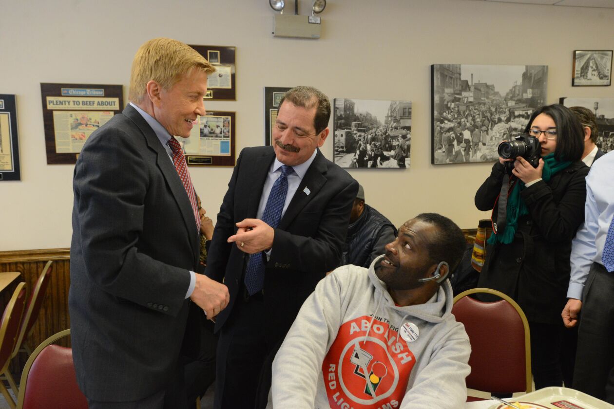 Alderman Bob Fioretti and Commissioner Jesus “Chuy” Garcia cross paths when they both stopped by Manny’s Deli for lunch. Tuesday, February 24, 2015 | Brian Jackson/ Sun-Times